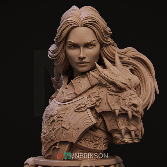 The Aleehra Bust by Nerikson (WintersailMiniatures) is an unpainted grey resin model featuring a woman in armor with a dragon-themed shoulder piece—ideal for miniature and STL collectors.